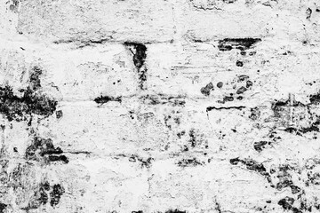 Texture of a brick wall with cracks and scratches which can be used as a background