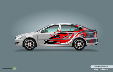 Car decal wrap design with abstract flame theme on metalic sedan car.