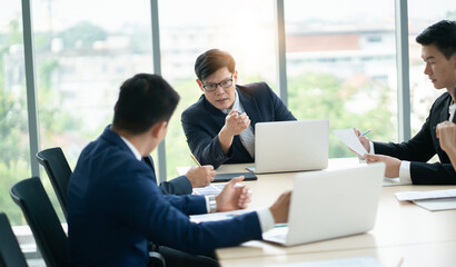 group of business people discussing a project at meeting room
