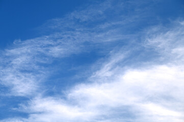 Naklejka na ściany i meble Blue sky with white tiny clouds during day