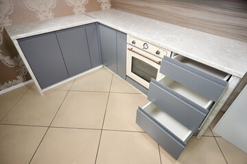 Solution for placing kitchen utensils in modern kitchen. Horizontal sliding pullout drawer shelves...