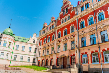 Obraz premium Beautiful view of the Old Town Hall square in Vyborg. Vyborg, Russia - 27 June 2021