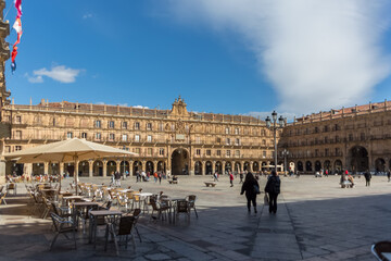 Fototapeta na wymiar View at the baroque public plaza, 18th century, Plaza Mayor in Salamanca downtown city, tourist people visiting