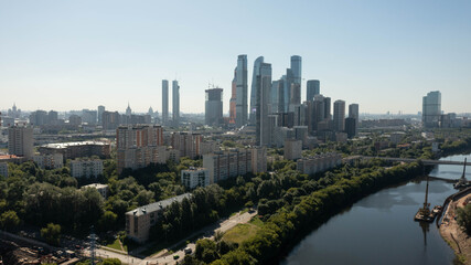 Fototapeta na wymiar view of the famous business center-Moscow city across the river at dawn. view of the modern city of Moscow. aerial view
