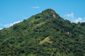 Rural landscape with mountains and blue sky in southwest Antioquia, Colombia.