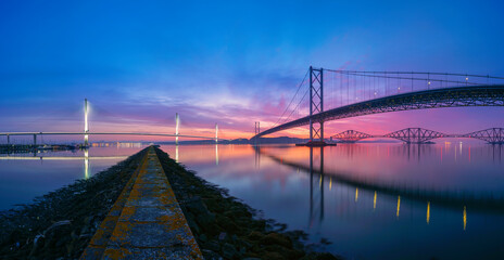 Panoramic Sunrise over the Forth Bridges looking towards fife, from South Queensferry, Edinburgh, Scotland.