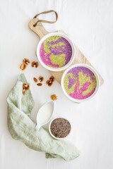 Colorful chia pudding in bowles for breakfast. Acai smoothies bowles