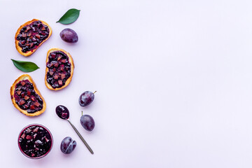 Sandwiches with plum jam, top view. Food layout