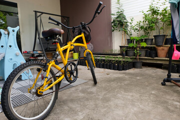 Yellow bicycle for housewives to the market