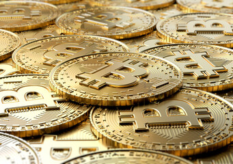 Fototapeta na wymiar Close Up Bitcoins. a group of gold bitcoins with one on top close up