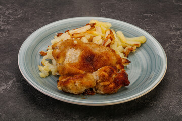 Pork schnitzel with roasted potato