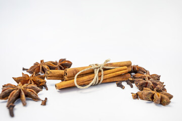 background with the image of cinnamon and anise isolated on a white background. spices. place for text on a white background