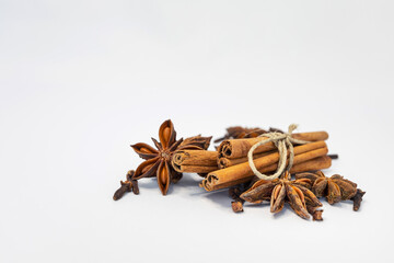 background with the image of cinnamon and anise isolated on a white background. spices. place for text on a white background