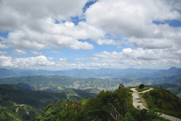 Curved asphalt road in high mountains of laos. Picture focus bottom right hand.
