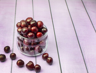 Sweet cherries in glassware. Concept of healthy and proper nutrition, diet, low calories. Top and side view. Selective focus.