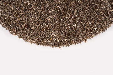 Chia seeds isolated with white background. Pile of healthy chia seeds background.
