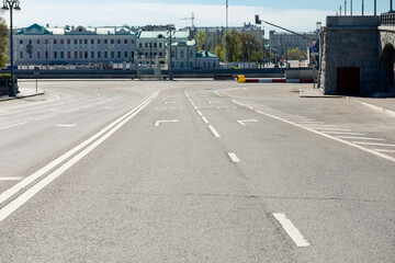 Empty highway in the city on a summer day. Pandemic in the city