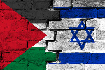 Concept of the relationship between Israel and the Palestinian Authorities with two painted flags on a damaged brick wall