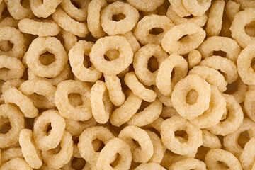 Variety of cold cereals, quick breakfast for kids overhead shot. Quick breakfast. Rings isolated on a white background. 
