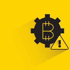 bitcoin and error symbol with shadow on yellow background