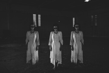 Portrait of asian woman make up ghost face,Horror scene,Scary background,Halloween poster,Stack...