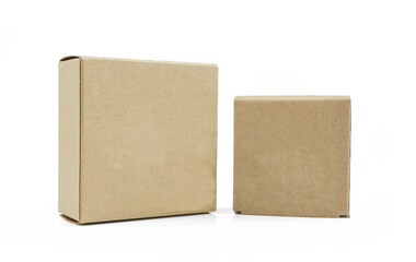 Two closed carboard boxes isolated on white background. 
Blank, carton made packages