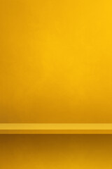 Empty shelf on a yellow wall. Background template. Vertical backdrop
