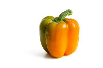 Bulgarian pepper with a smooth yellow-green skin on a white background