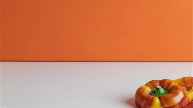 Red and orange pepper stop action