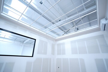Interior Render from construction, Metal frame of the new building against the roof