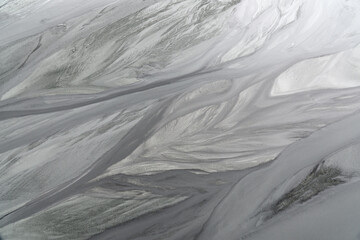 texture of fine gray sand mixed with water
