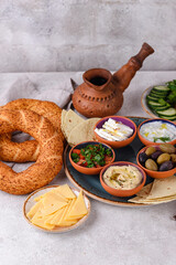 Traditional Turkish breakfast with meze and simit
