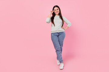 Full body photo of happy nice cheerful young woman hold hand waist wear glasses isolated on pink color background