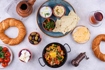 Traditional Turkish breakfast with meze and simit