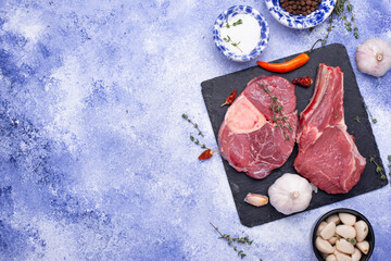 Raw uncooked ossobucco steak with spices