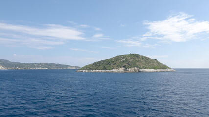 View of the mountains of an Aegean Island in Greece. Shooting from water.