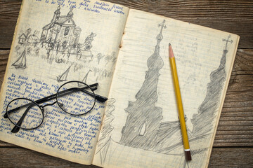 Vintage travel journal with handwriting and pencil sketches - kayak expedition in Poland 1970s.