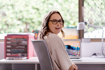 happy young woman at home. from a series featuring a woman with Down Syndrome