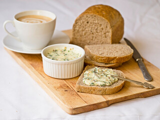 Breakfast of homemade cheese, rye bread,cup of coffee. Healthy breakfast. Close up. Copy space.