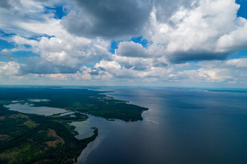 Obraz premium Aerial view of clouds over the valley and the Kiev Sea at sunset