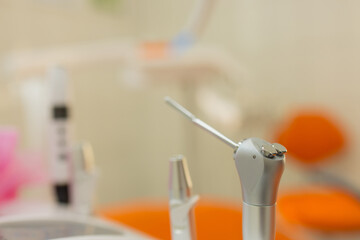 Dentist's instruments with shallow depth of field.