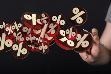 sale digital percent in hand.