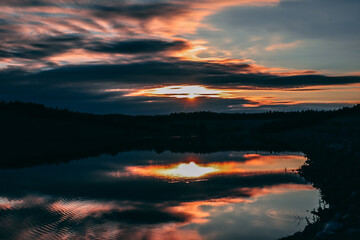 Fototapeta premium sunset over the lake