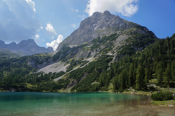 Fototapeta na wymiar Seebensee lake with mountain in a background (Austria).