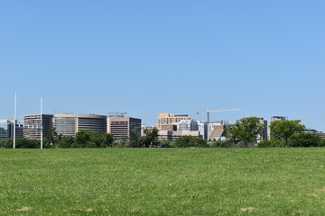 Fototapeta na wymiar Arlington, VA, USA - June 28, 2021: Skyline of downtown Arlington, VA, as viewed from Gravelly Point Park.