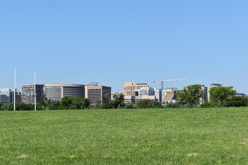 Fototapeta premium Arlington, VA, USA - June 28, 2021: Skyline of downtown Arlington, VA, as viewed from Gravelly Point Park.