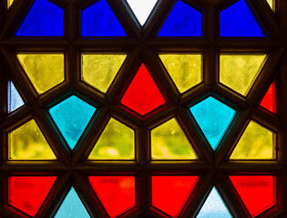 Glass stained glass window. The stained glass is colored.