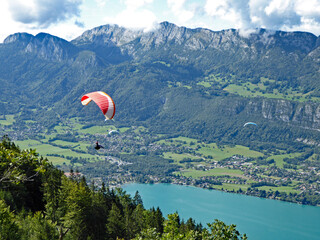 Paraglider above Lake Annecy in the French Alps	