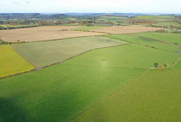 Paragliding above the fields at Monks Down in Wiltshire