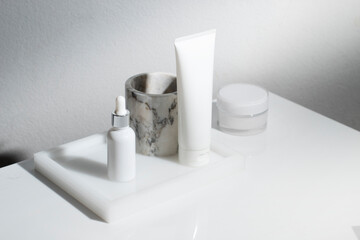 mockup of beauty fashion cosmetic makeup bottle lotion  serum product with skincare healthcare concept on background